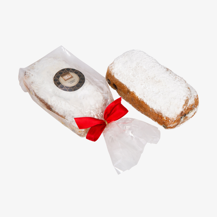 Confiserie-Stollen in transparenter Tüte mit roter Schleife und individuellem Aufkleber